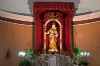 Particolare altare maggiore con statua lignea di Santa Lucia